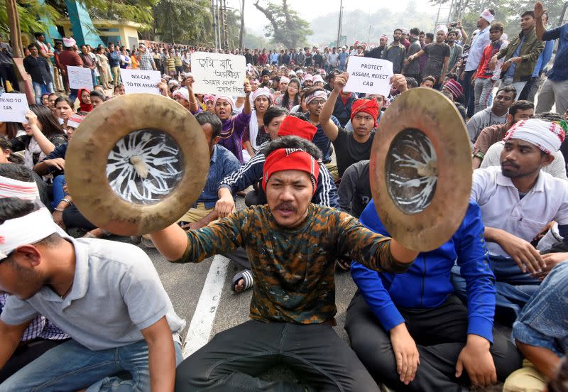 Demonstrators shout slogans during a protest against Citizenship Amendment Bill, in Guwahati