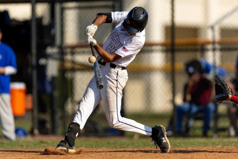 West Broward batter Jason Wachs (22) hits the ball for an inside the park grandslam to tie the game 5-5 during a high school baseball regional semi-final game against South Dade at Bobcat Field in Pembroke Pines, Florida, on Wednesday, May 10, 2023.
