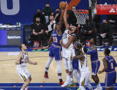 Utah Jazz center Rudy Gobert (27) blocks a shot by New York Knicks center Mitchell Robinson (23) during the first half of an NBA basketball game Wednesday, Jan. 6, 2021, in New York. (Wendell Cruz/Pool Photo via AP)