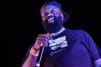 <p>Rick Ross performs during the Parking Lot Concert Series in Atlanta on Saturday night.</p>