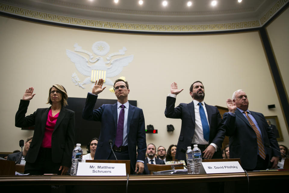 From left, Sally Hubbard, director of enforcement strategy at Open Markets Institute, from left, Matthew Schruers, vice president of law and policy at the Computer and Communications Industry Association, David Pitofsky, general counsel with News Corp., and Kevin Riley, editor at the Atlanta-Journal Constitution, are sworn in during a House Judiciary Subcommittee hearing in Washington, D.C., U.S., on Tuesday, June 11, 2019.  (Al Drago/Bloomberg via Getty Images)