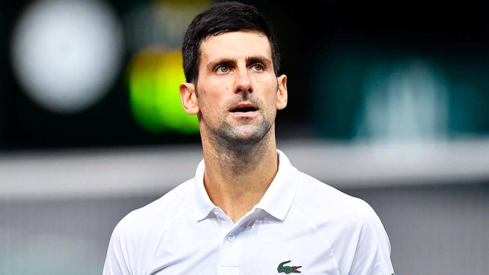 Novak Djokovic (pictured) looking at his players box during a match.
