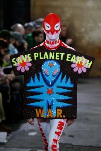 Fashion alert: Belgian designer Walter Van Beirendonck, who has been highly critical of the fashion industry, used his Paris men's fashion week show to call for action on the environment