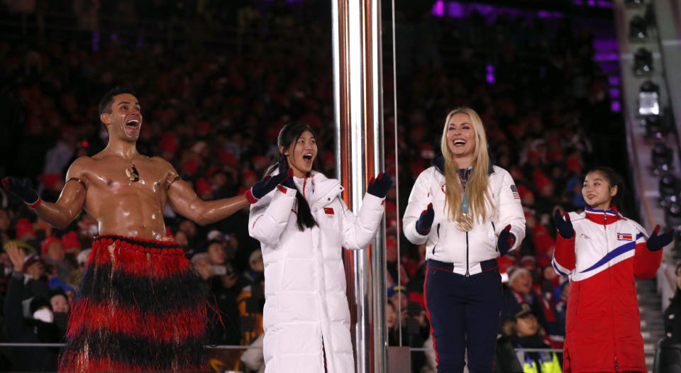 Pita Taufatofua of Tonga, Liu Jiayu of China, Lindsey Vonn of the U.S. and Ryom Tae-ok of North Korea attend the ceremony.