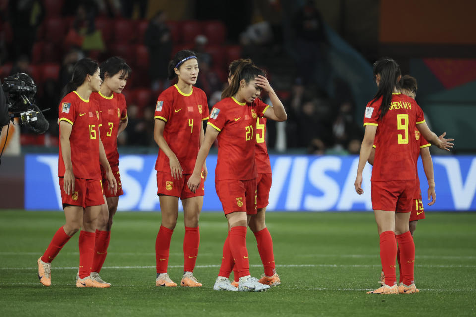 China women soccer team members looks dejected after the Women's World Cup Group D soccer match between China and England in Adelaide, Australia, Tuesday, Aug. 1, 2023. (AP Photo/James Elsby)