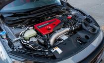 <p>But it's also considerably more powerful and has a superior power-to-weight ratio. Inhaling 22.8 psi of boost, the Civic's turbocharged 2.0-liter inline-four makes 306 horsepower, which means each of the Type R's ponies has to move 10.2 pounds.</p>