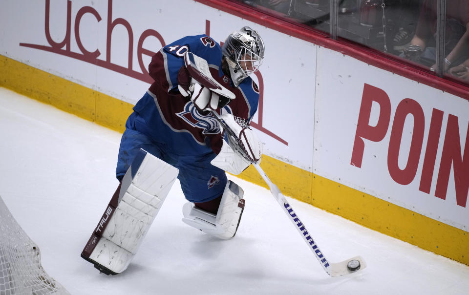 Colorado Avalanche goaltender Alexandar Georgiev clears the puck during the third period of the team's NHL hockey game against the Edmonton Oilers on Tuesday, April 11, 2023, in Denver. (AP Photo/David Zalubowski