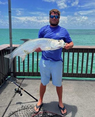 Cody Latner of Seminole caught this 37-inch tarpon while fishing at Big Pier 60 in Clearwater on Monday. 