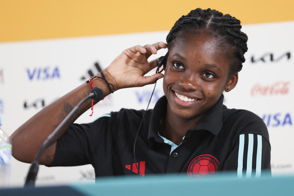Colombia's forward Linda Caicedo speaks during a news conference at the Sydney Football Stadium in Sydney, Australia, Monday, July 24, 2023. Caicedo,18, was diagnosed with ovarian cancer at 15. "I was going into surgery one day and I was feeling really bad," Caicedo said through a translator. "I thought that I was not going to be able to play top-level football again." (AP Photo/Jessica Gratigny)