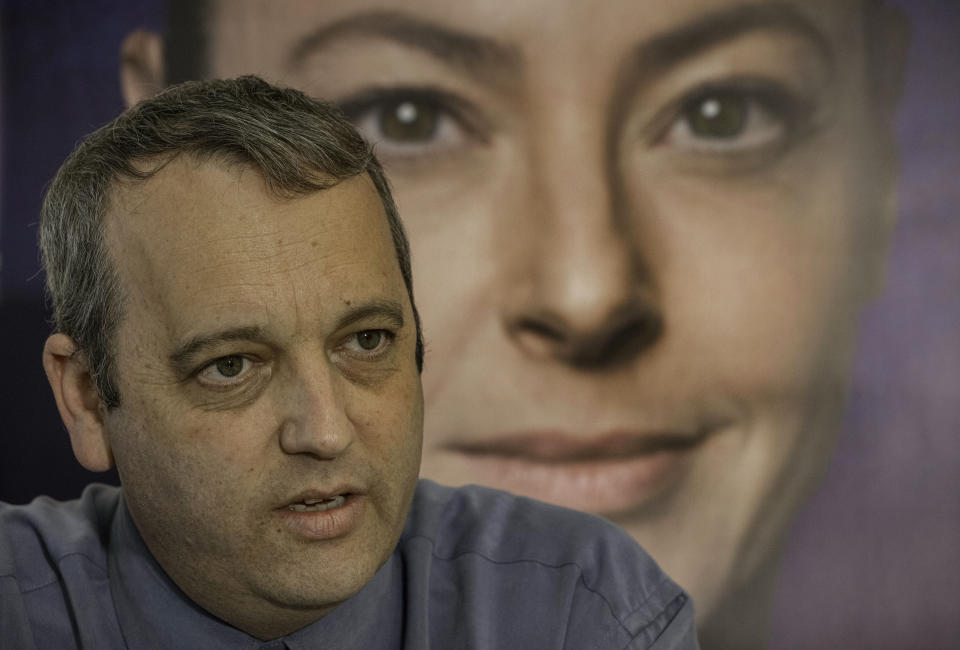 Gilad Kariv, leader of the Reform movement in Israel and a candidate for Knesset on the Labor party list, poses for a photo at the Party's headquarter In Tel Aviv, Israel, Wednesday, March 17, 2021. Gilad Kariv is poised to make history this month as the first Reform rabbi to win a seat in Israel's parliament. Holding a solid position on the slate of the center-left Labor party, Kariv's political ascent marks an important victory for religious pluralism and the millions of American Jews who belong to liberal streams of Judaism that have long been sidelined in Israel. (AP Photo/Tsafrir Abayov)