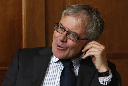 Bank of England Monetary Policy Committee member David Miles speaks during an Interview with Reuters in his office at the Bank of England, in the City of London September 19, 2013. REUTERS/Suzanne Plunkett