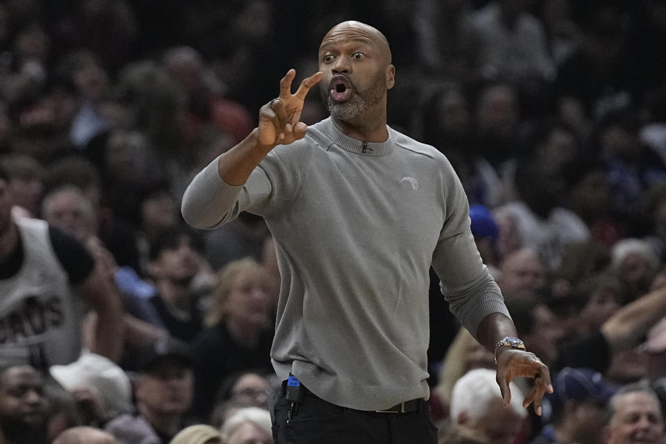 Orlando Magic head coach Jamahl Mosley gestures in the first half of Game 7 of an NBA basketball first-round playoff series against the Cleveland Cavaliers, Sunday, May 5, 2024, in Cleveland. (AP Photo/Sue Ogrocki)