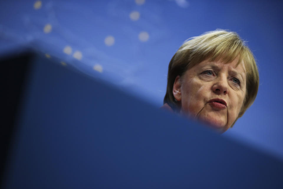 German Chancellor Angela Merkel speaks during a media conference during an EU summit in Brussels, Friday, Dec. 13, 2019. European Union leaders gathered for their year-end summit and discussed climate change funding, the departure of the UK from the bloc and their next 7-year budget. (AP Photo/Francisco Seco)