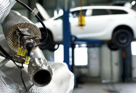 FILE PHOTO: A market ready particulate filter retrofit system for passenger cars to avoid diesel emission is pictured in a garage of German exhaust aftertreatment technology group Baumot in Witten, Germany, March 7, 2018. REUTERS/Thilo Schmuelgen