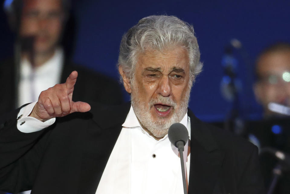 FILE- In this Aug. 28, 2019, file photo, opera singer Placido Domingo performs during a concert in Szeged, Hungary. In an interview published Wednesday Dec. 4, 2019, in a leading Spanish newspaper, Domingo has sought to blame allegations of sexual harassment against him, on cultural differences between countries. (AP Photo/Laszlo Balogh, File)