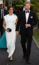 <p>Prince Harry wears his black tie best during a visit at the Consular House in NukuÕalofa with Meghan Markle. </p>