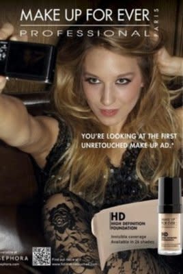 A new ad hitting glossy magazines this week features an unretouched model's flawless skin. 