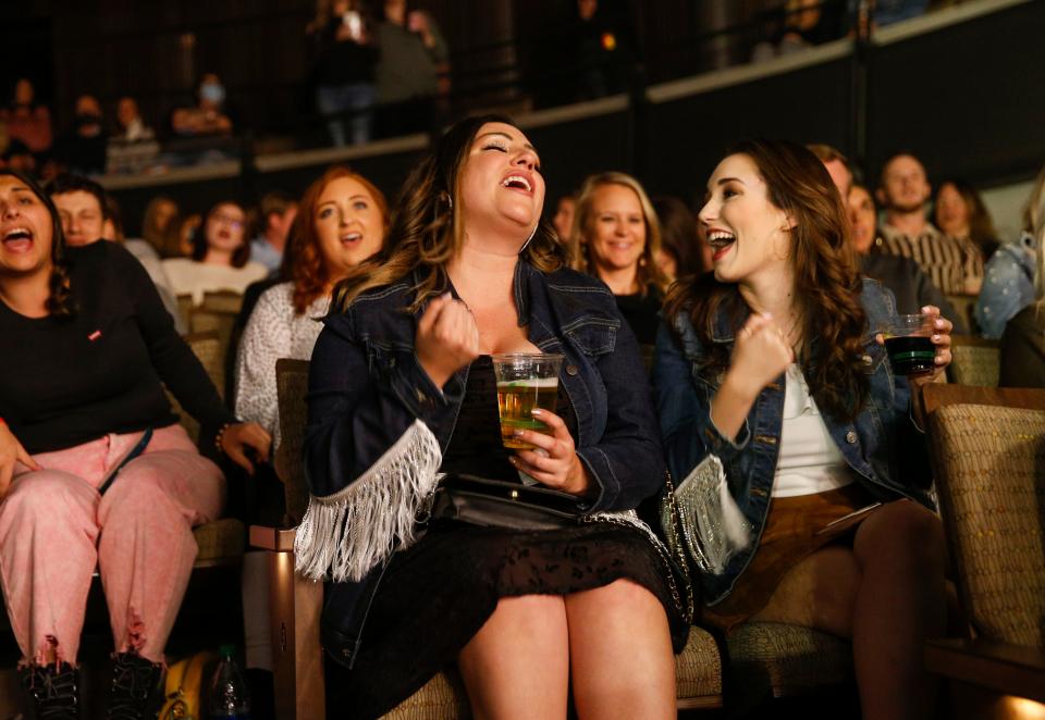 Fans stomp and sing along with Carly Pearce during Pearce's Nashville stop on her "The 29 Tour" at the CMA Theater in Nashville, Tenn., on Thursday, Dec. 2, 2021. 