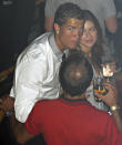 In this June 2009 photo made available to the Associated Press on Friday Oct. 5, 2018, soccer star Cristiano Ronaldo is pictured with Kathryn Mayorga in Rain Nightclub in Las Vegas. A lawyer for Mayorga, who is alleging that Ronaldo raped her in Las Vegas in 2009 said her client was "emotionally fragile" and agreed to an out-of-court financial settlement nine years ago because then she never wanted her name made public. Mayorga filed a lawsuit last week in state court seeking to void the agreement she signed while accepting $375,000 to keep quiet about the alleged encounter. (Matrixpictures via AP) NO SALES NO ARCHIVE MANDATORY CREDIT