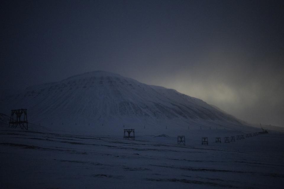 An old wire rope tramway leads from the Gruve 7 coal mine to Adventdalen, Norway, Monday, Jan. 9, 2023. For more than 100 years, people came to the remote Arctic archipelago of Svalbard to work in coal mines. (AP Photo/Daniel Cole)