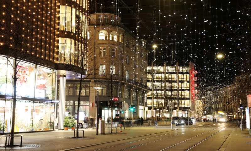 FILE PHOTO: Christmas decorations light up the Bahnhofstrasse shopping street during the continuing coronavirus outbreak in the city centre of Zurich, Switzerland