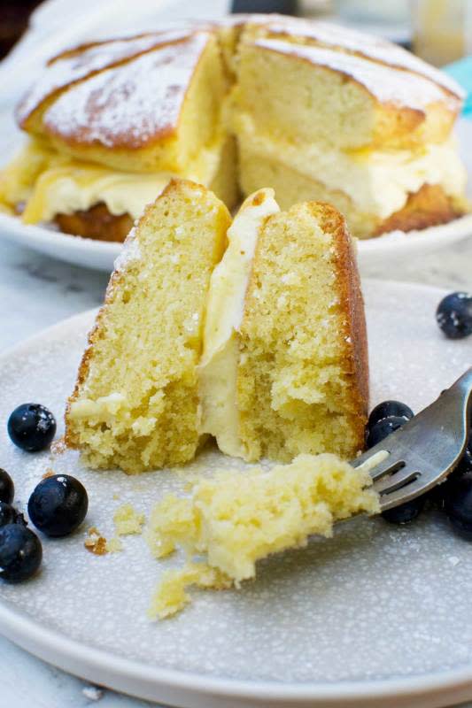 <p>Scrummy Lane</p><p>Then sandwich together the cake layers with a ridiculously easy 2-ingredient lemon mascarpone cream. It’s classic Victoria sponge meets lemon cake – light, moist and delicious, and perfect for a special occasion or just a simple afternoon tea.</p><p><strong>Get the recipe: </strong><a href="https://scrummylane.com/really-easy-lemon-mascarpone-cake/?fbclid=IwAR3yeDO3aUSfVJlWqo_5ga8kBMSSjWd-Lr87zG9jqLmxjR7B6-5YNnYS2pQ" rel="nofollow noopener" target="_blank" data-ylk="slk:Easy Lemon Mascarpone Cake;elm:context_link;itc:0;sec:content-canvas" class="link "><strong>Easy Lemon Mascarpone Cake</strong></a></p>