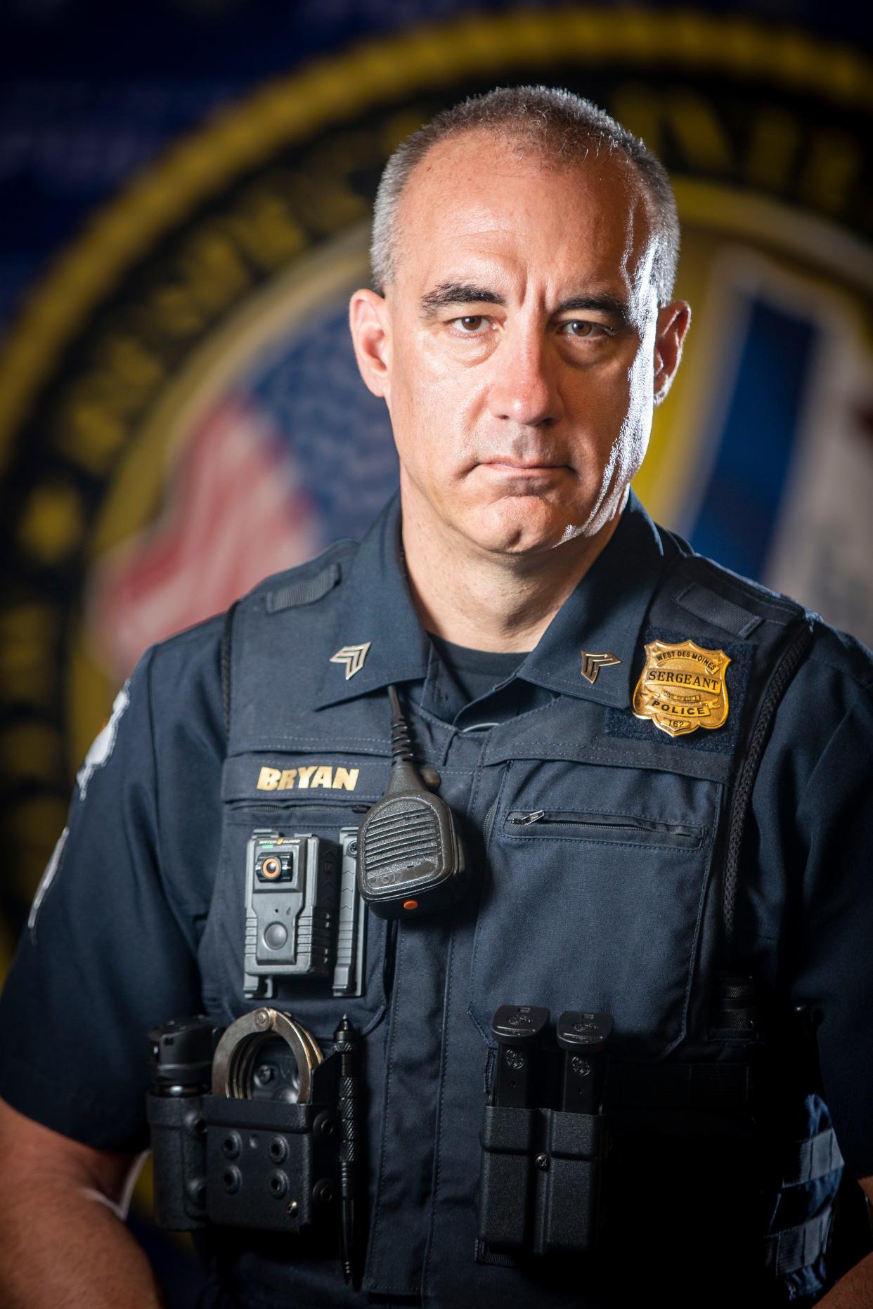 Sgt. Jason Bryan of the West Des Moines Police stands for a photo at the police department Thursday, April 8, 2021.