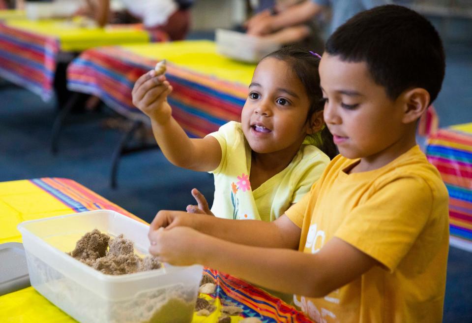 Selah Medina, 4, shows off a shell from a sandbox after the library story time on Thursday, June 30, 2022 at the Lely South Regional Library in Naples, Fla.