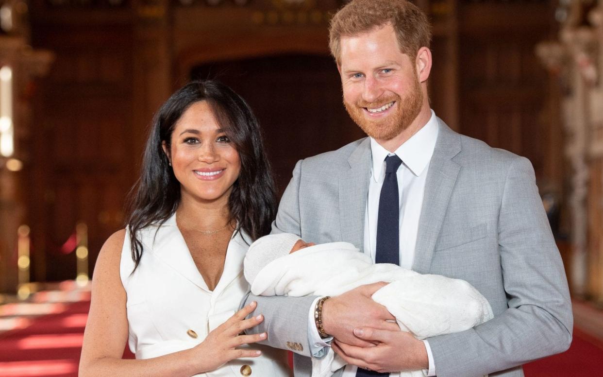 The Duke and Duchess of Sussex with their baby son, who was born on Monday morning - PA