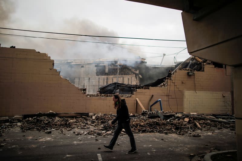 Plumes of smoke rise into the sky in the aftermath of a protest in Minneapolis