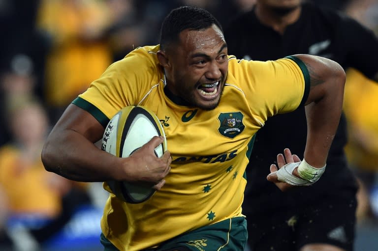 Australia's Sekope Kepu runs in a successful try against the New Zealand All Blacks during the Bledisloe Cup Test match as part of the Rugby Championship in Sydney on August 8, 2015