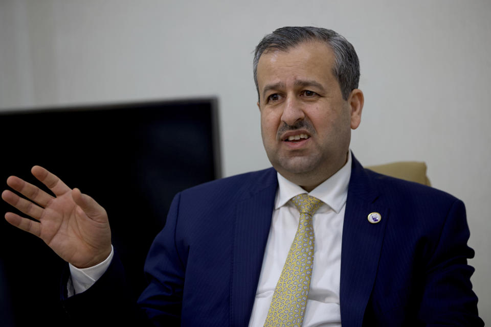 Judge Jaleel Adnan Khalaf, chairman of the Iraqi Independent High Electoral Commission, speaks during an interview with The Associated Press, Tuesday, Sept. 14, 2021, in Baghdad, Iraq. Iraq has identified and thwarted attempts of voter fraud less than one month before Iraq is set to hold federal polls including the selling of votes and intimidation using arms, the head of Iraq's electoral commission said. (AP Photo/Hadi Mizban)