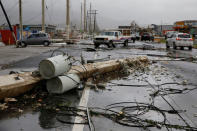 Damaged electrical installations are seen after the area was hit by Hurricane Maria en Guayama, Puerto Rico September 20, 2017. REUTERS/Carlos Garcia Rawlins