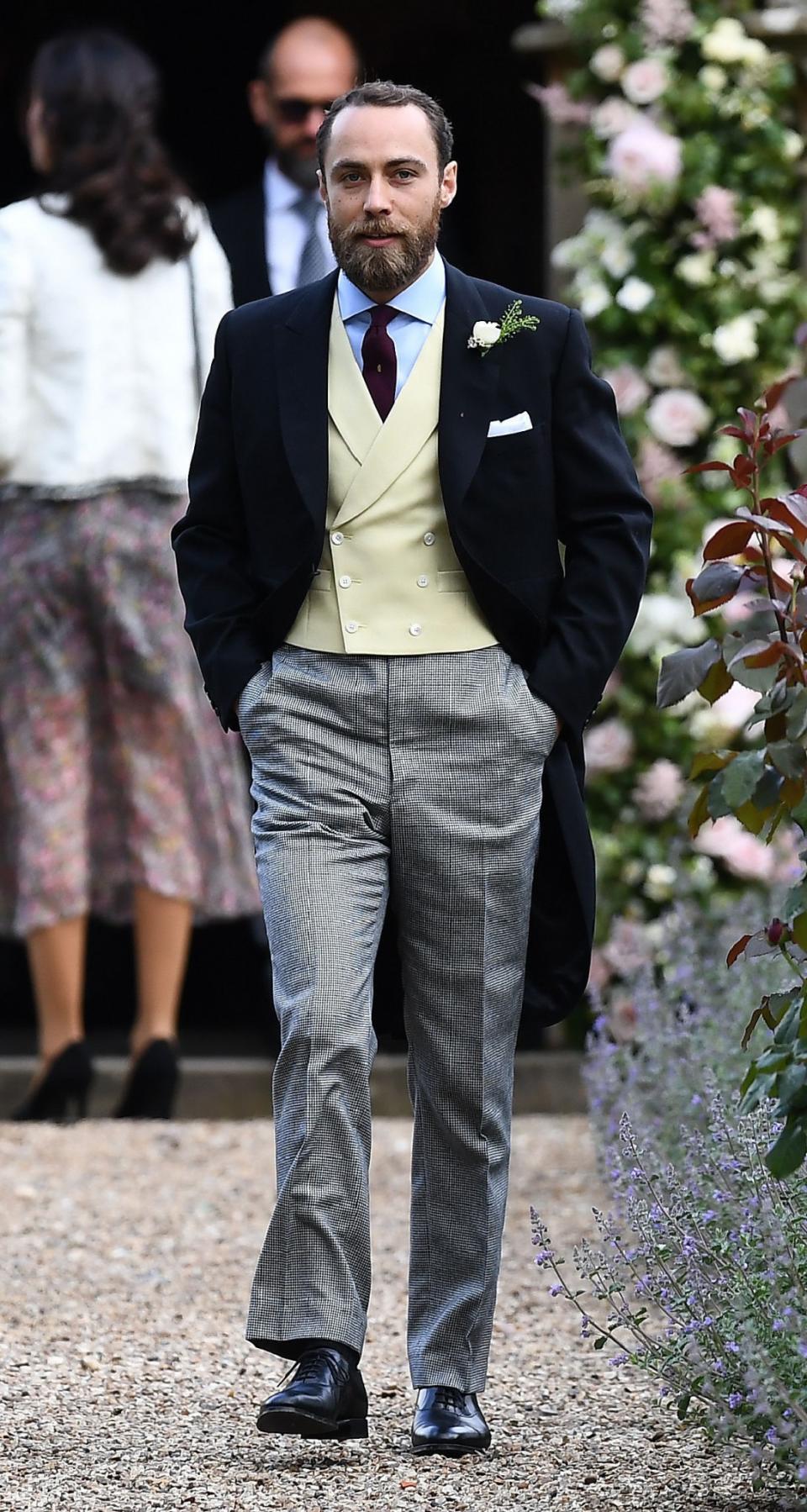 <p>Pippa’s brother looked dapper in a cream vest and long navy coat. (Photo: PA) </p>