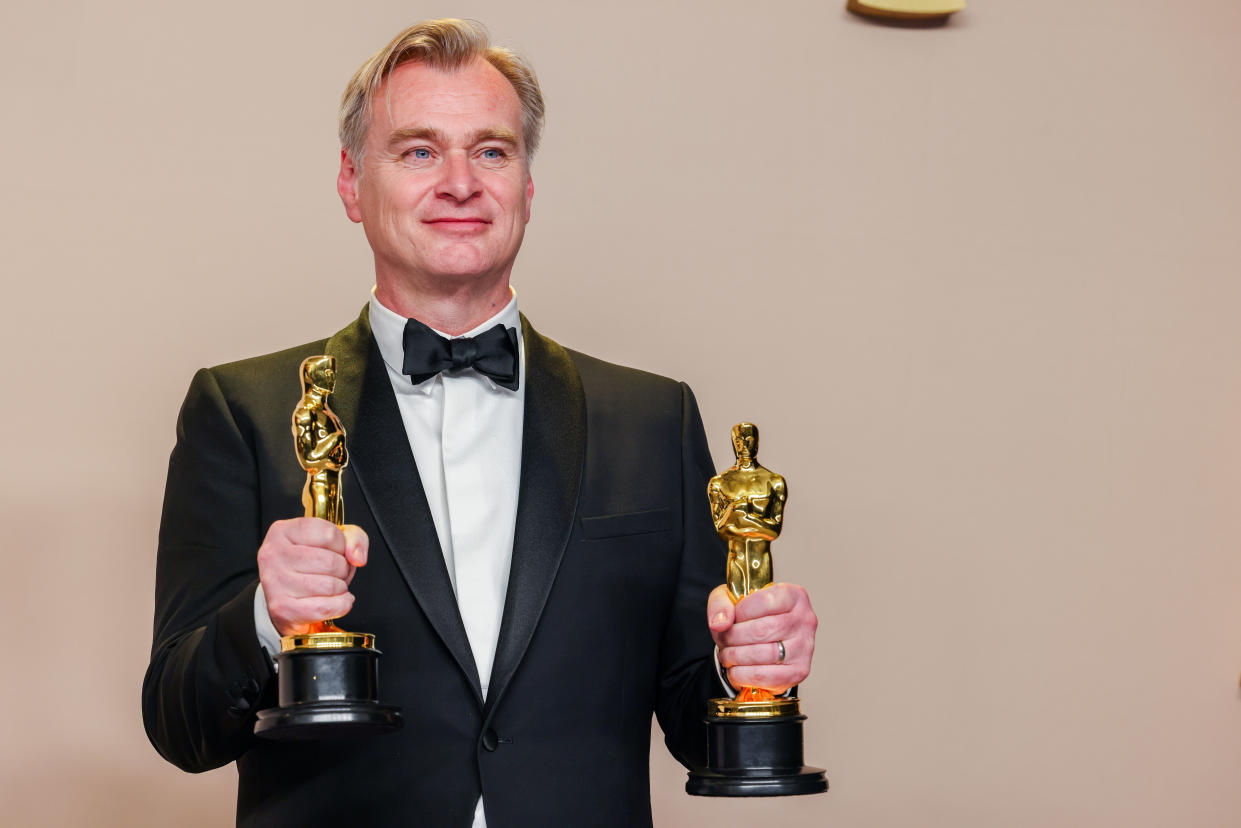 Hollywood, CA - March 10: Christopher Nolan with the Oscar for Best Picture for 