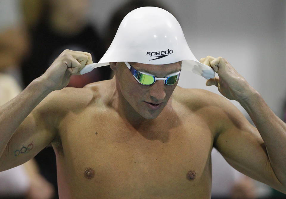 Ryan Lochte prepares to compete in the men's 100m backstroke final during the 2012 Charlotte UltraSwim Grand Prix at Mecklenburg County Aquatic Center on May 12, 2012 in Charlotte, North Carolina. (Photo by Streeter Lecka/Getty Images)