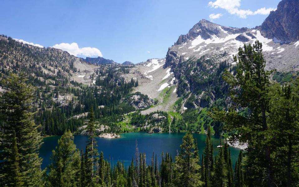 The colors of Alpine Lake, backed by Alpine Peak, provide a beautiful backdrop for photos. Chadd Cripe/ccripe@idahostatesman.com