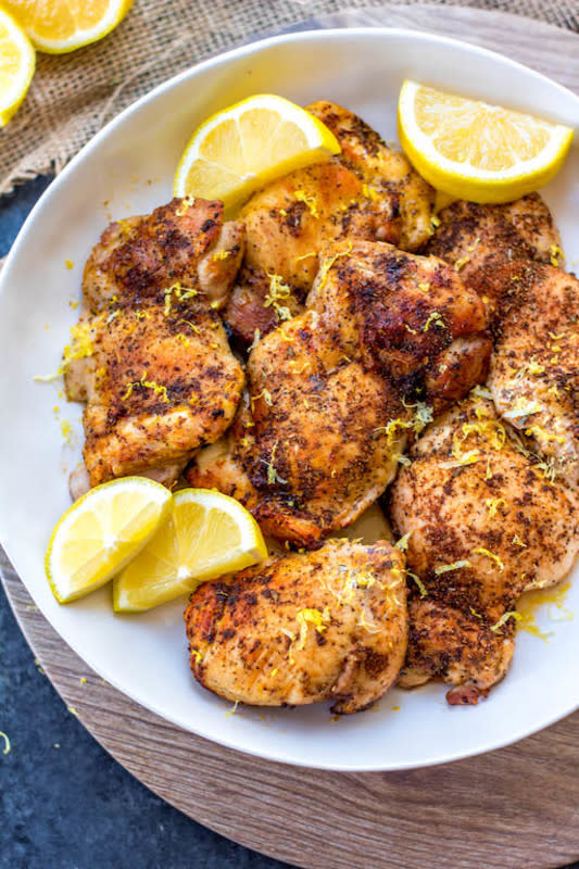 <p>These paleo and Whole30 air fryer lemon pepper chicken thighs are crispy on the outside and full of juicy flavor on the inside. This keto and gluten free recipe is one of the easiest ways to get dinner on the table or meal prep done in just under 30 minutes.</p><p><strong>Get the recipe: <a href="https://www.wholekitchensink.com/air-fryer-lemon-pepper-chicken-thighs/" rel="nofollow noopener" target="_blank" data-ylk="slk:Air Fryer Lemon Chicken Thighs;elm:context_link;itc:0;sec:content-canvas" class="link rapid-noclick-resp">Air Fryer Lemon Chicken Thighs</a></strong></p>