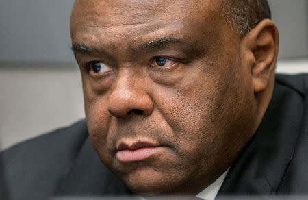 FILE PHOTO: Jean-Pierre Bemba Gombo is seen in a court room of the ICC to hear the delivery of the judgment on charges including corruptly influencing witnesses by giving them money and instructions to provide false testimony and false evidence, in the Hague, the Netherlands, March 21, 2016. REUTERS/JERRY LAMPEN/Pool/File Photo