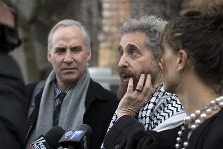 Suleiman Abu Ghaith's defense attorney Stanley Cohen (C) speak to the press outside the Manhattan Federal Court house in New York, March 24, 2014. REUTERS/Brendan McDermid