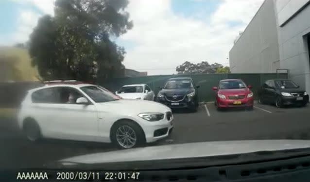 The furious driver had to wait for a moment while another parked. Source: Dash Cam Owners Australia