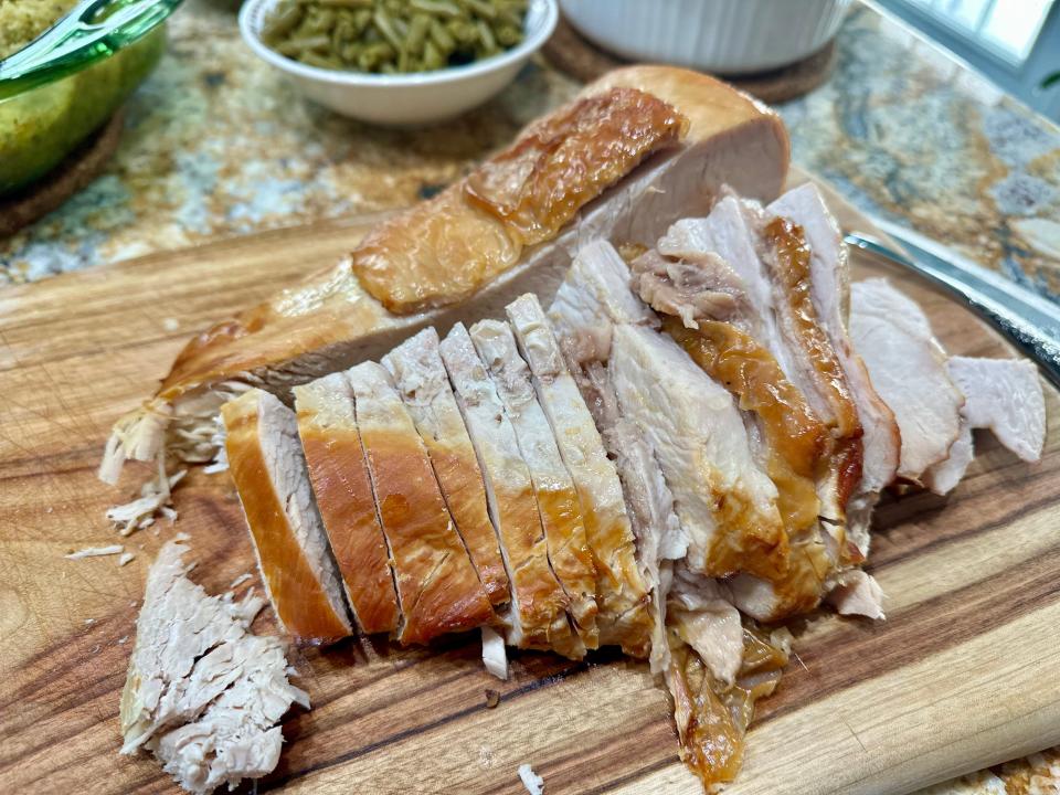 Sliced. turkey on wood cutting board