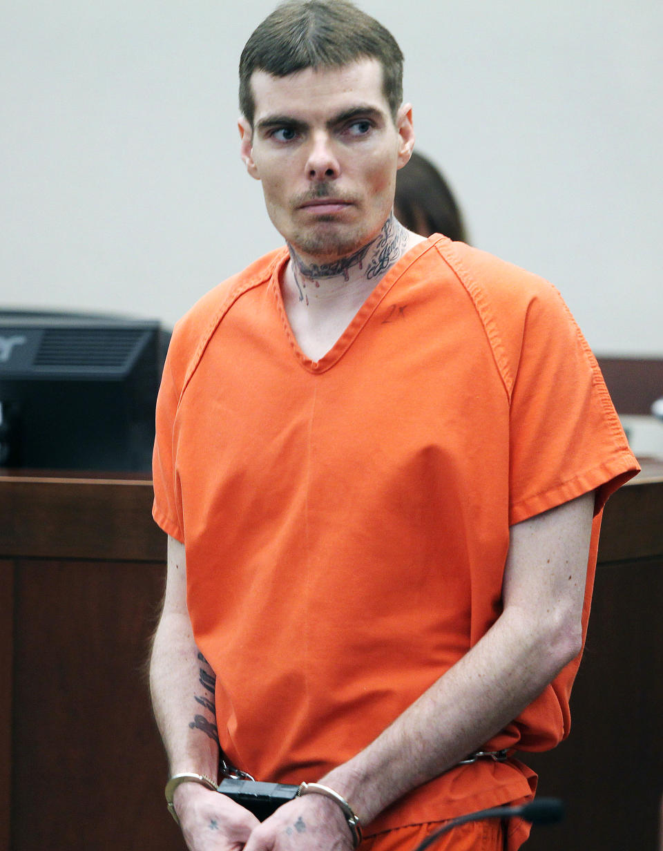 Charles Richard Jennings Jr. glances at his family members as he arrives for his sentencing at Second District Court in Ogden, Utah, Thursday, Feb. 20, 2014. Jennings, charged with shooting his wife's father during a Father's Day Mass, has been sentenced to four years to life in prison. He took a plea deal in November, pleading guilty and mentally ill to charges of attempted murder and aggravated burglary. He also acknowledged a firearms violation. (AP Photo/Standard-Examiner, Brian Nicholson, Pool)