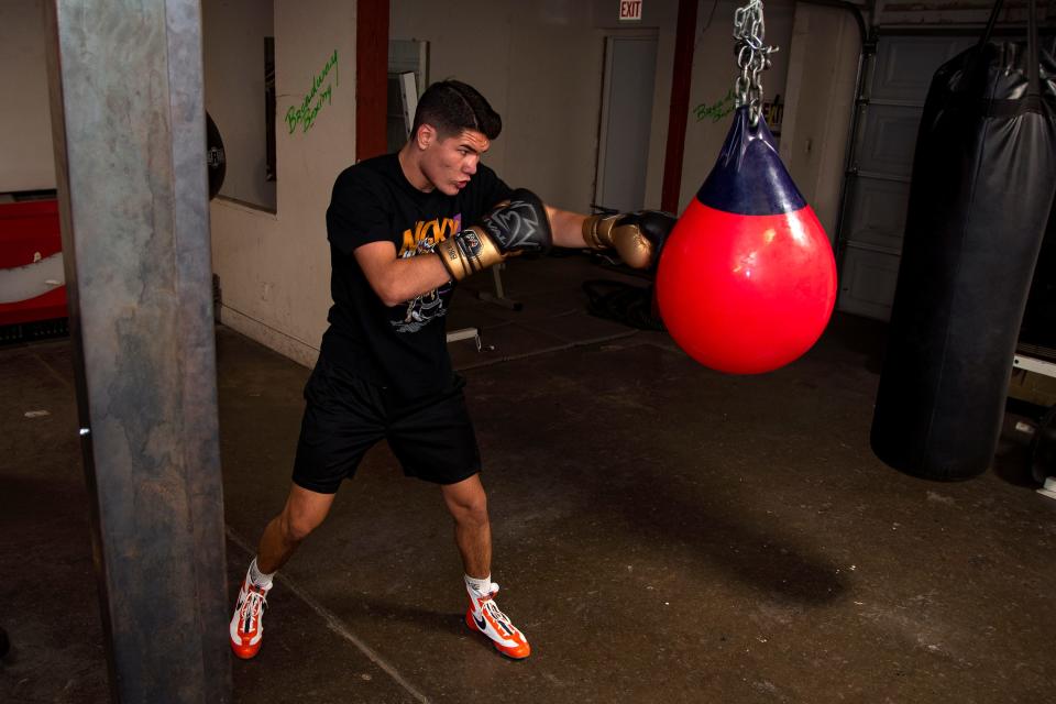 Boxer Micky Scala trains inside the Broadway Boxing Club in Mesa on Dec. 7, 2021.