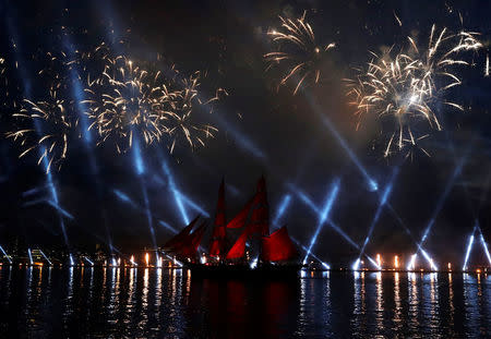 Sweden's brig Tre Kronor with scarlet sails floats on the Neva River during the Scarlet Sails festivities marking school graduation, in St. Petersburg, Russia, June 24, 2018. REUTERS/Henry Romero