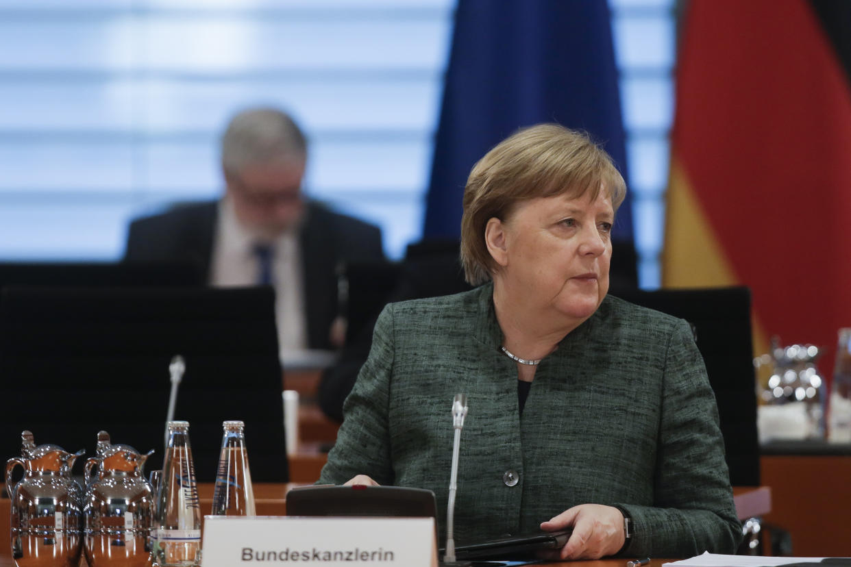 German Chancellor Angela Merkel attends the weekly cabinet meeting of the German government at the chancellery in Berlin, on April 8, 2020, amidst the new coronavirus COVID-19 pandemic. - In order to slow down the spread of the coronavirus, the German government has considerably restricted public life and asked the citizens to stay at home. The new coronavirus COVID-19 causes mild or moderate symptoms for most people, but for some, especially older adults and people with existing health problems, it can cause more severe illness or death. (Photo by Markus Schreiber / POOL / AFP) (Photo by MARKUS SCHREIBER/POOL/AFP via Getty Images)