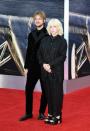 <p>Billie Eilish wore a striped Gucci shirt and trousers with platform shoes to attend the premiere with her brother, Finneas O'Connell. The pair wrote and performed the film's soundtrack. </p>