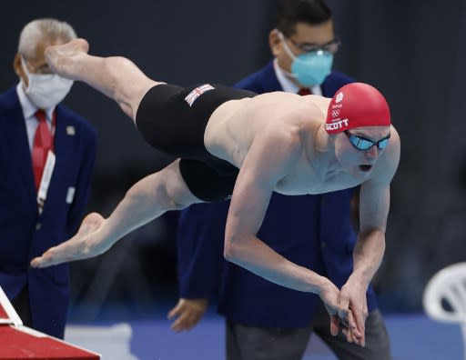 英國泳將杜思二度確診仍拿下自由式金牌。法新社