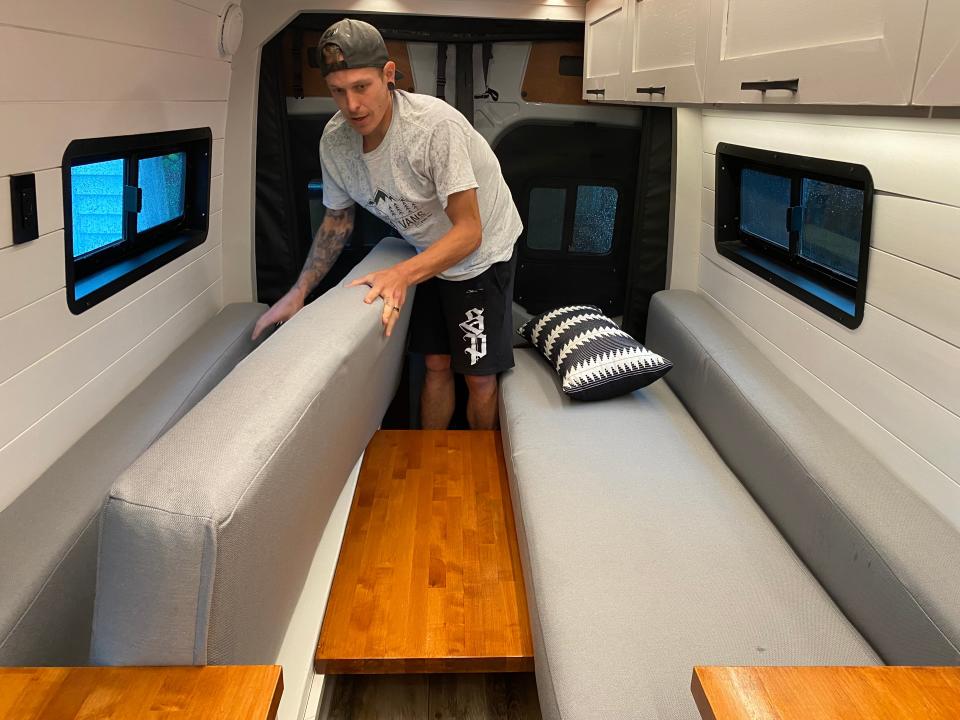 Danny and Kelley Diatchenko from VaVaVans showing off some of their custom camper work. In this full build they did, the dining table and seating area converts into a bed for the owner.