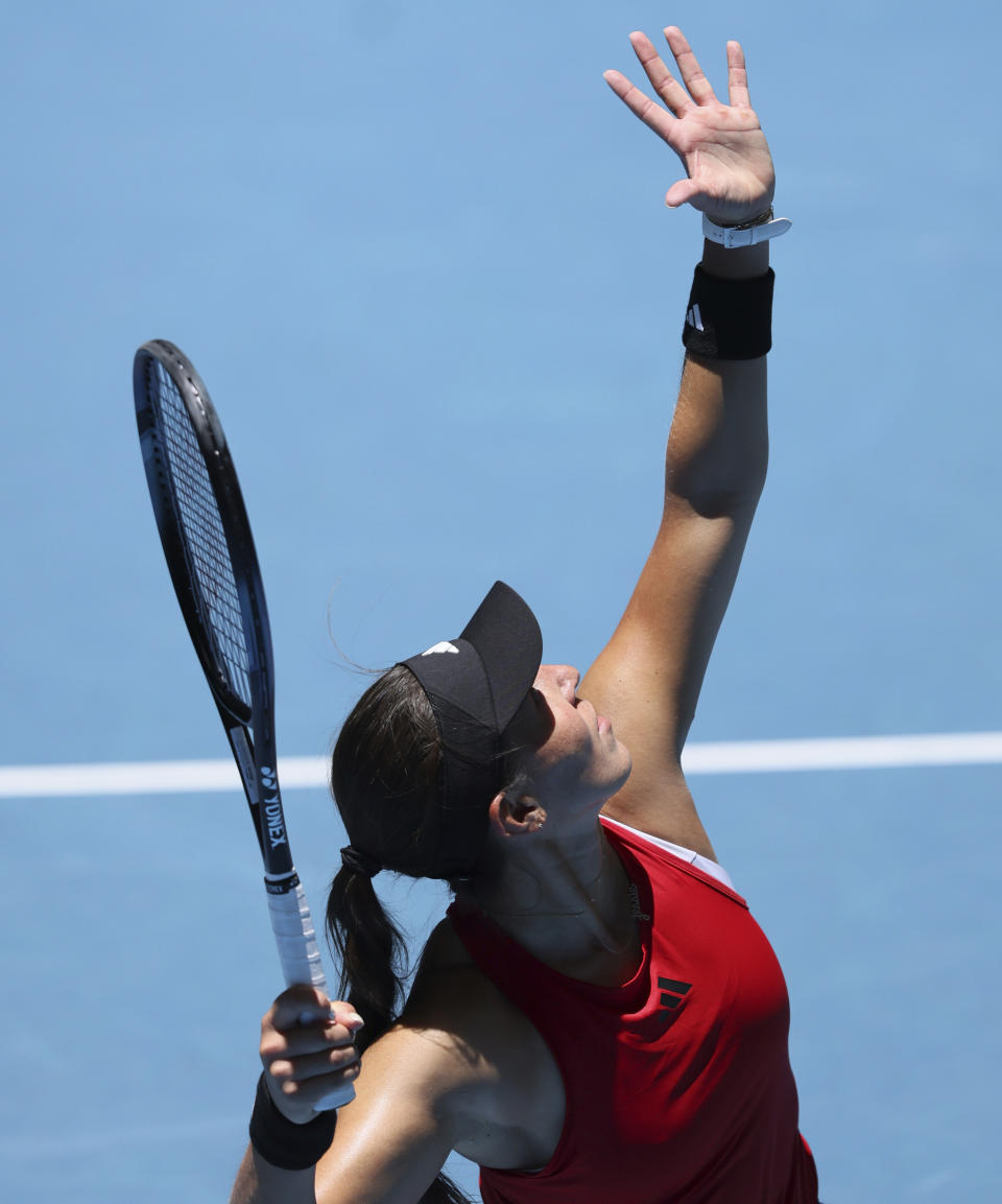 Jessica Pegula of the United States serves to Katie Boulter of Britain during the United Cup tennis tournament in Perth, Australia, Sunday, Dec. 31, 2023. (AP Photo/Trevor Collens)